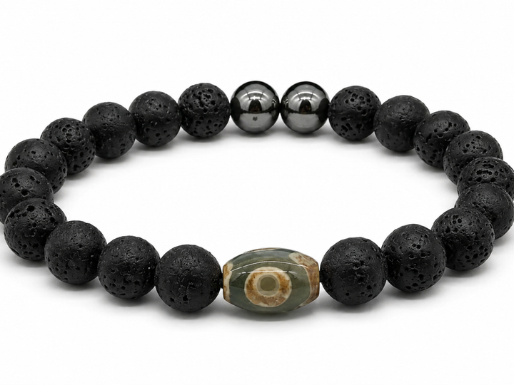 Fiery Shield of Protection Bracelet by House of Sheelaa, featuring black lava stone beads, shiny hematite beads, and a real evil eye bead for nazar protection and grounding.