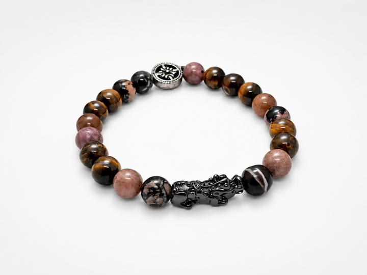 Pixiu Mulank 7 Bracelet by House of Sheelaa, featuring polished tiger eye and pink-toned gemstone beads with a black Pixiu charm and silver accent bead.