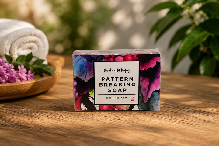 Pattern Breaking Soap by House of Sheelaa, wrapped in a colourful floral label and styled on a wooden surface with soft greenery and spa-inspired décor.