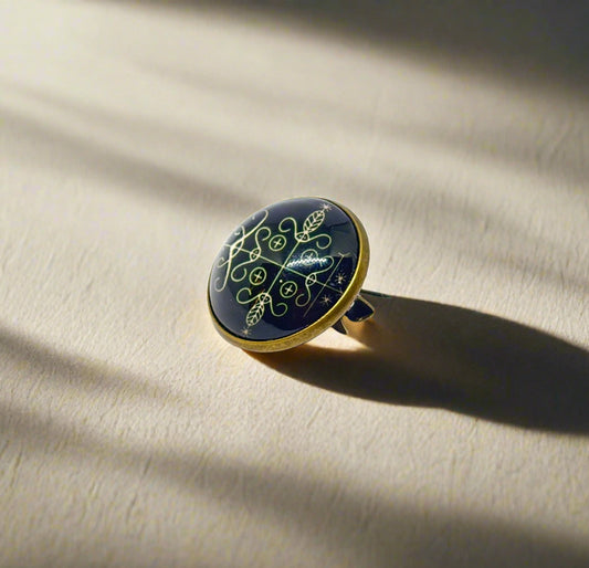 Sheela M Bajaj's Eleguas Amulet Badge