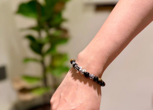 Sheelaa Pixiu Career Bracelet with Tiger's Eye and Black Tourmaline on dark luxury background