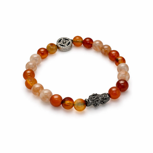 Mulank 1 Red Carnelian Sunstone Pixiu bracelet by Sheelaa M Bajaj on black velvet surface